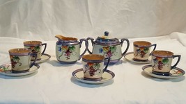 Small child&#39;s  tea set hand painted in japan No teapot.  Very cute! Grap... - $24.74