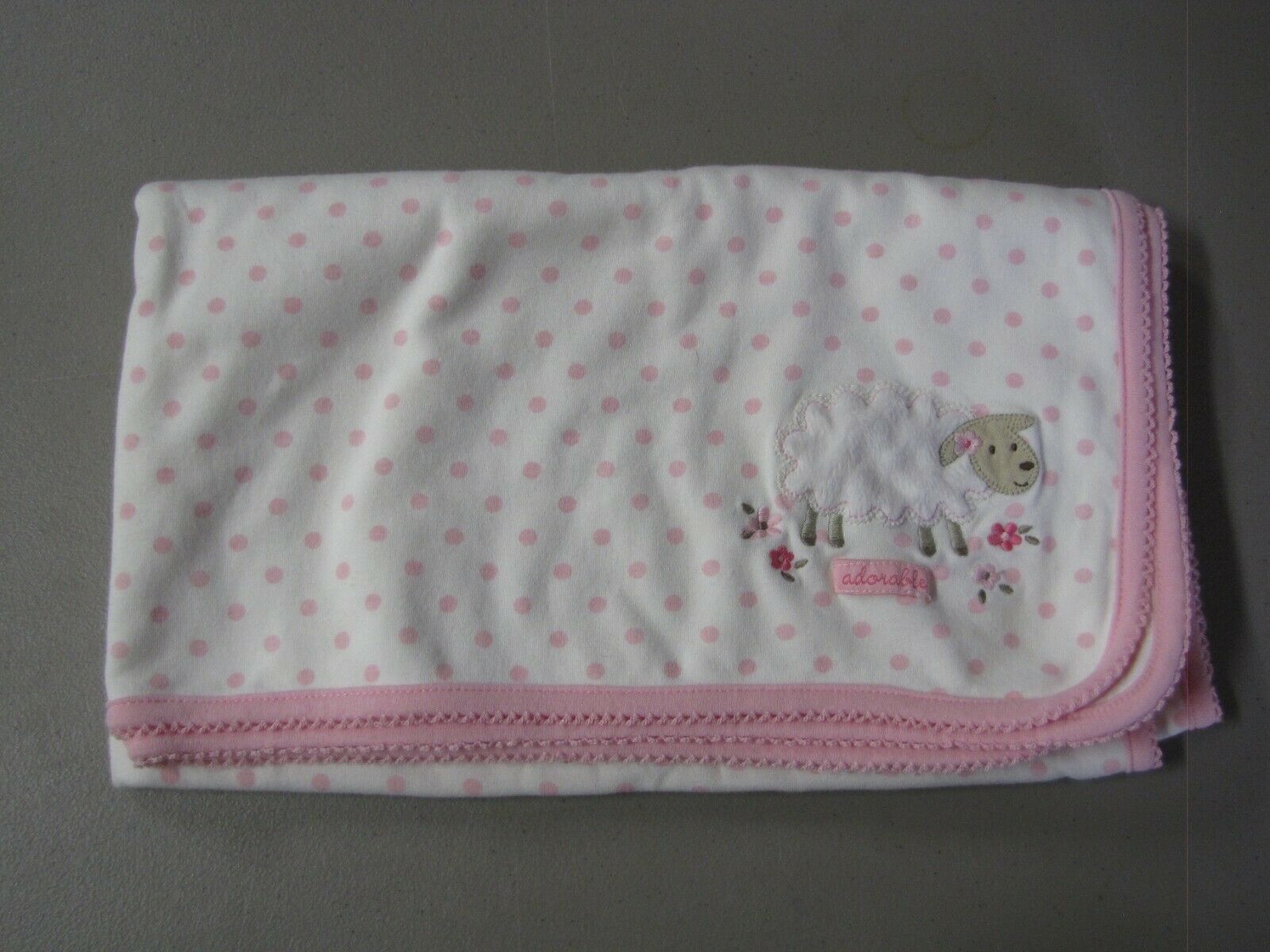 carter's pink and white polka dot blanket