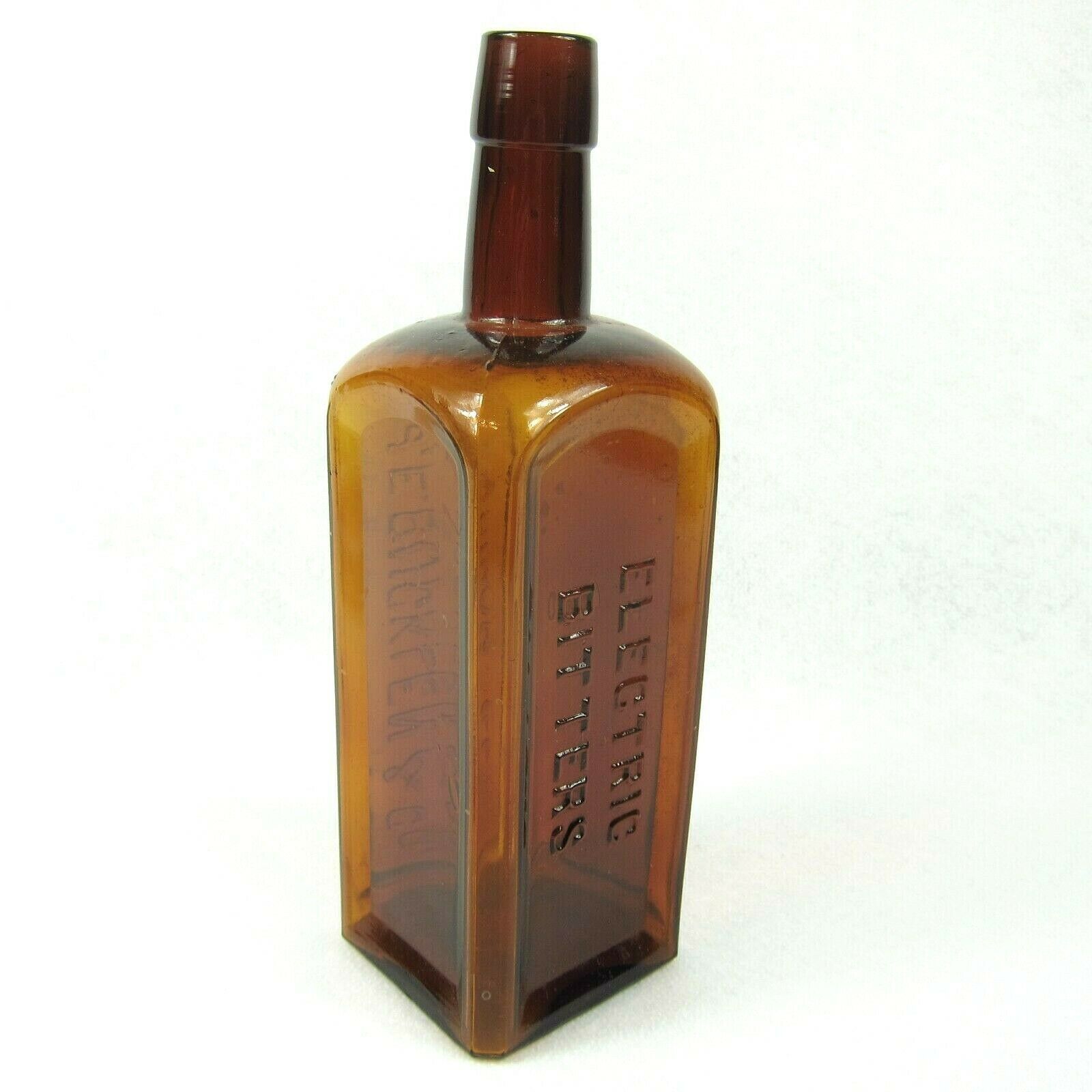 Antique 1800s Electric Bitters Glass Bottle Puce Amber Handtooled