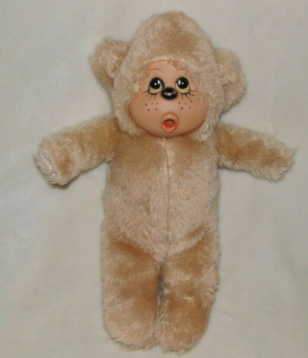 teddy bear with plastic face