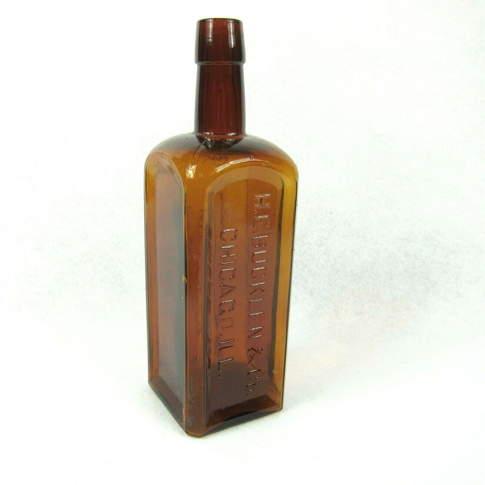 Antique 1800s Electric Bitters Glass Bottle Puce Amber Handtooled