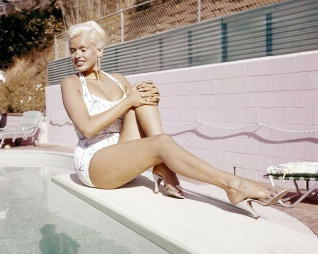 Jayne Mansfield sits on her diving board at her home pool 24x36 inch Poster