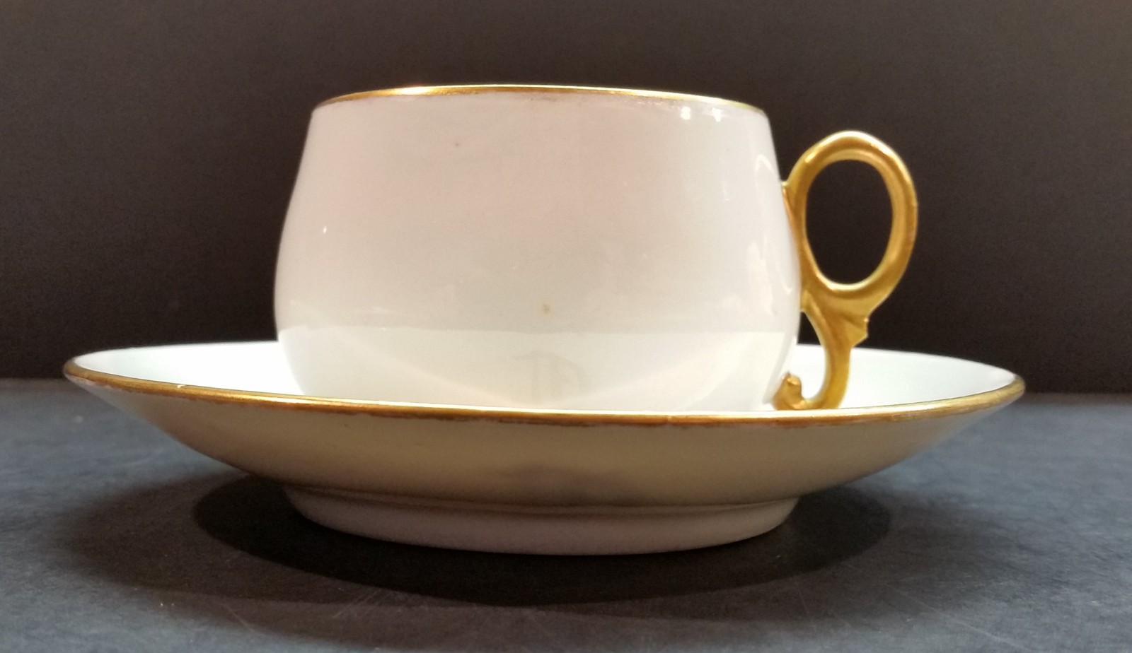 Limoges Gold Trim Cup and Saucer with “D” in gold on the saucer and ...