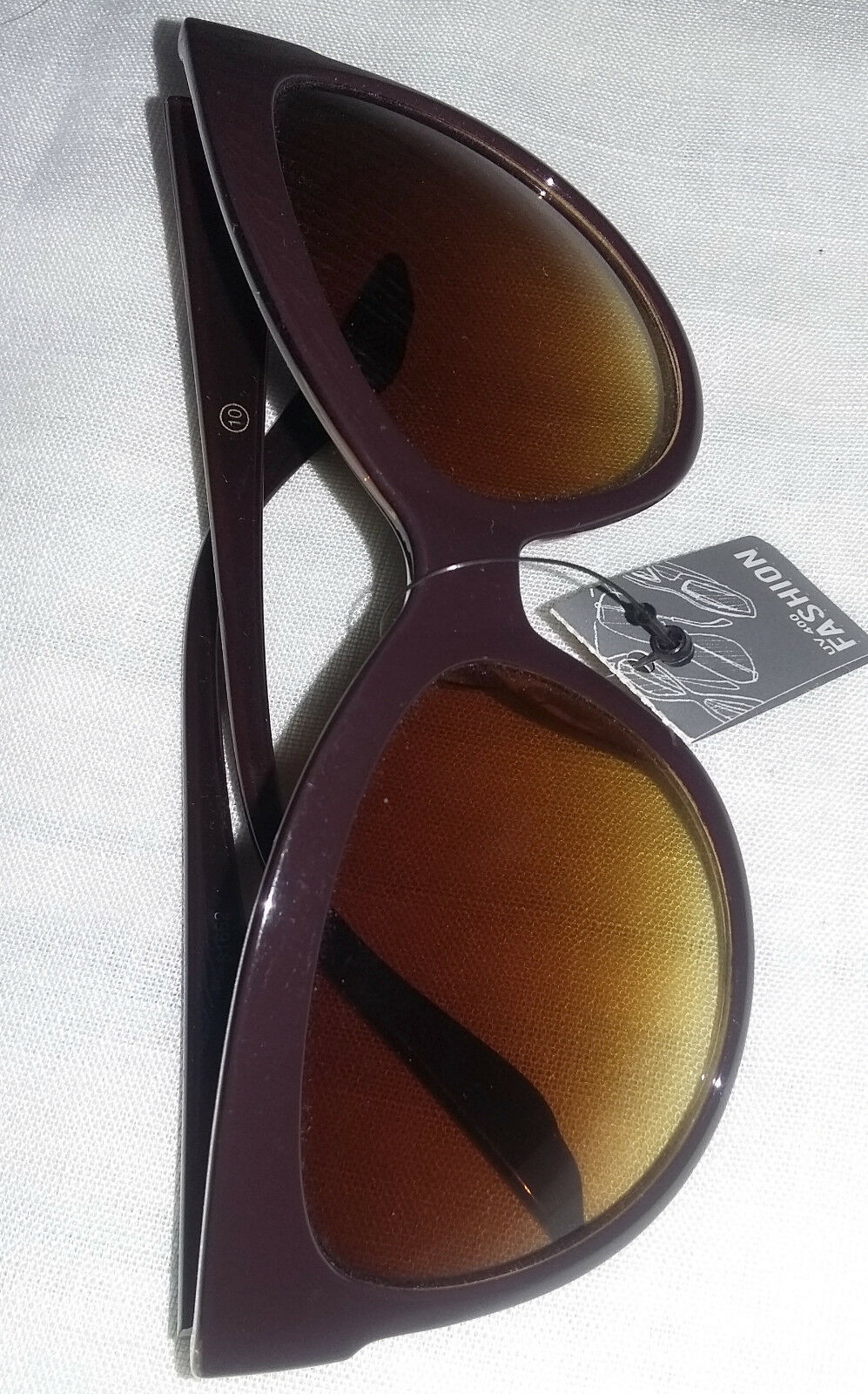 Foster Grant Niki Chrome Metal Frame Woman’s Round Cateye Sunglasses Brown Lens