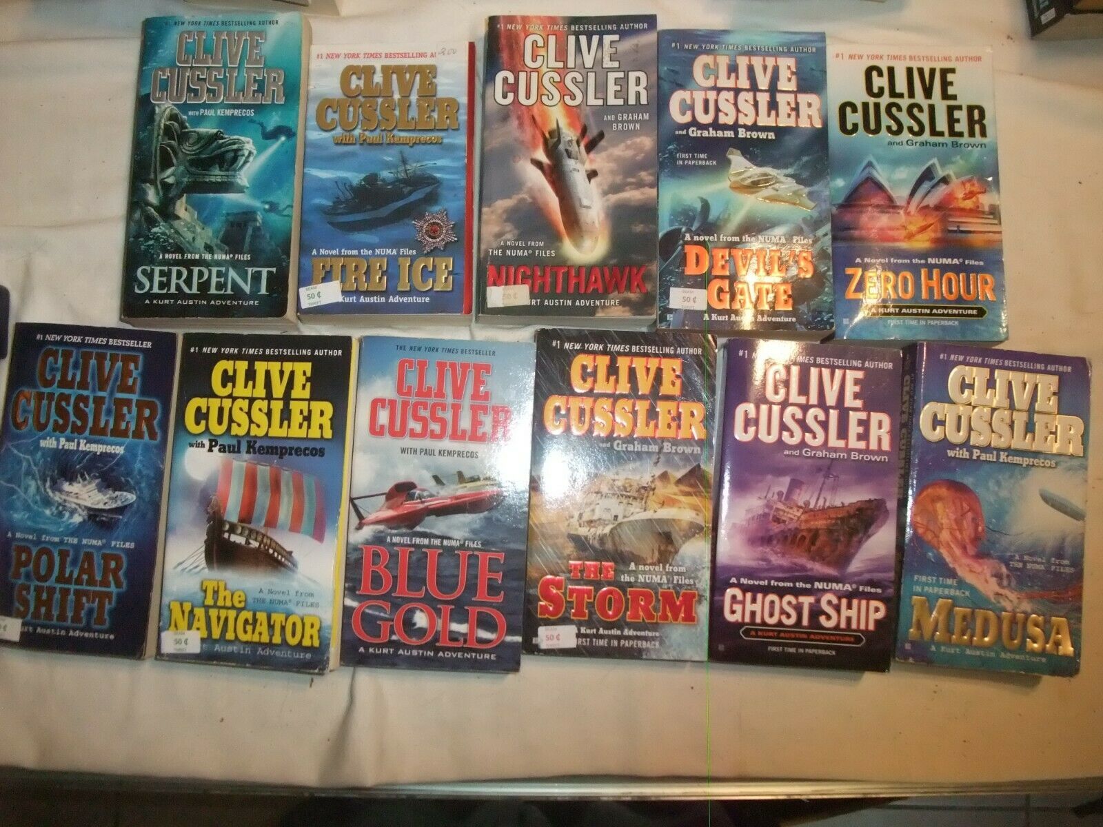 Clive Cussler~Lot of 11 PB~Kurt Austin Series - Fiction & Literature