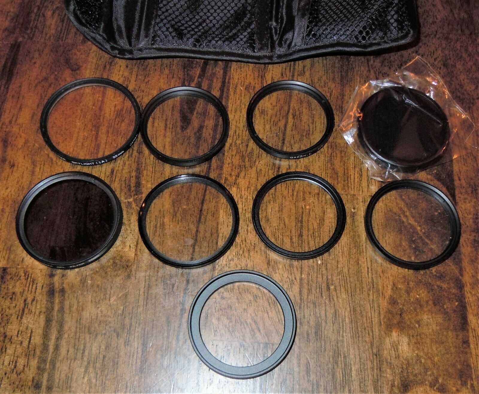 Primary image for 9pc Lot of 49mm 52mm & 55MM Camera Lens Filters Opteka UV ND8 CPL Skylight