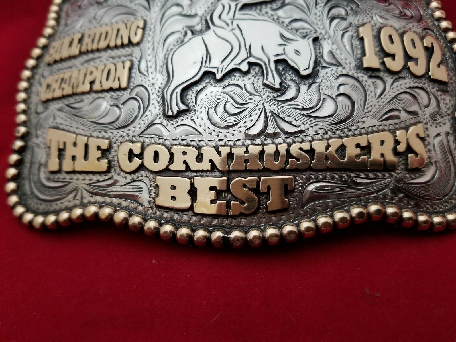 VINTAGE RODEO BELT BUCKLE 1992 OMAHA NEBRASKA BULL RIDING CHAMPION 309