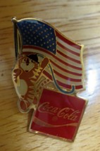 Coca-Cola lapel pin with American flag and tiger - $11.83