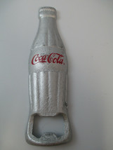Coca-Cola Bottle Opener Silver Cast Iron Contour Bottle Shape Script Logo - $5.94