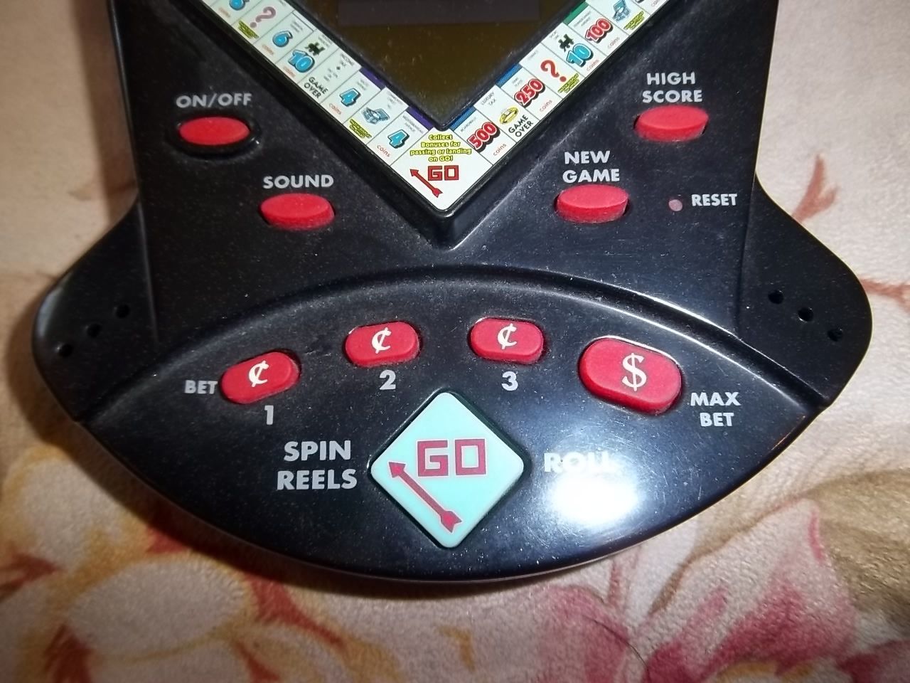 electronic handheld video slot machine game