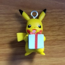 Pokemon Battle Pikachu with Present 1.75" Christmas Ornament image 1