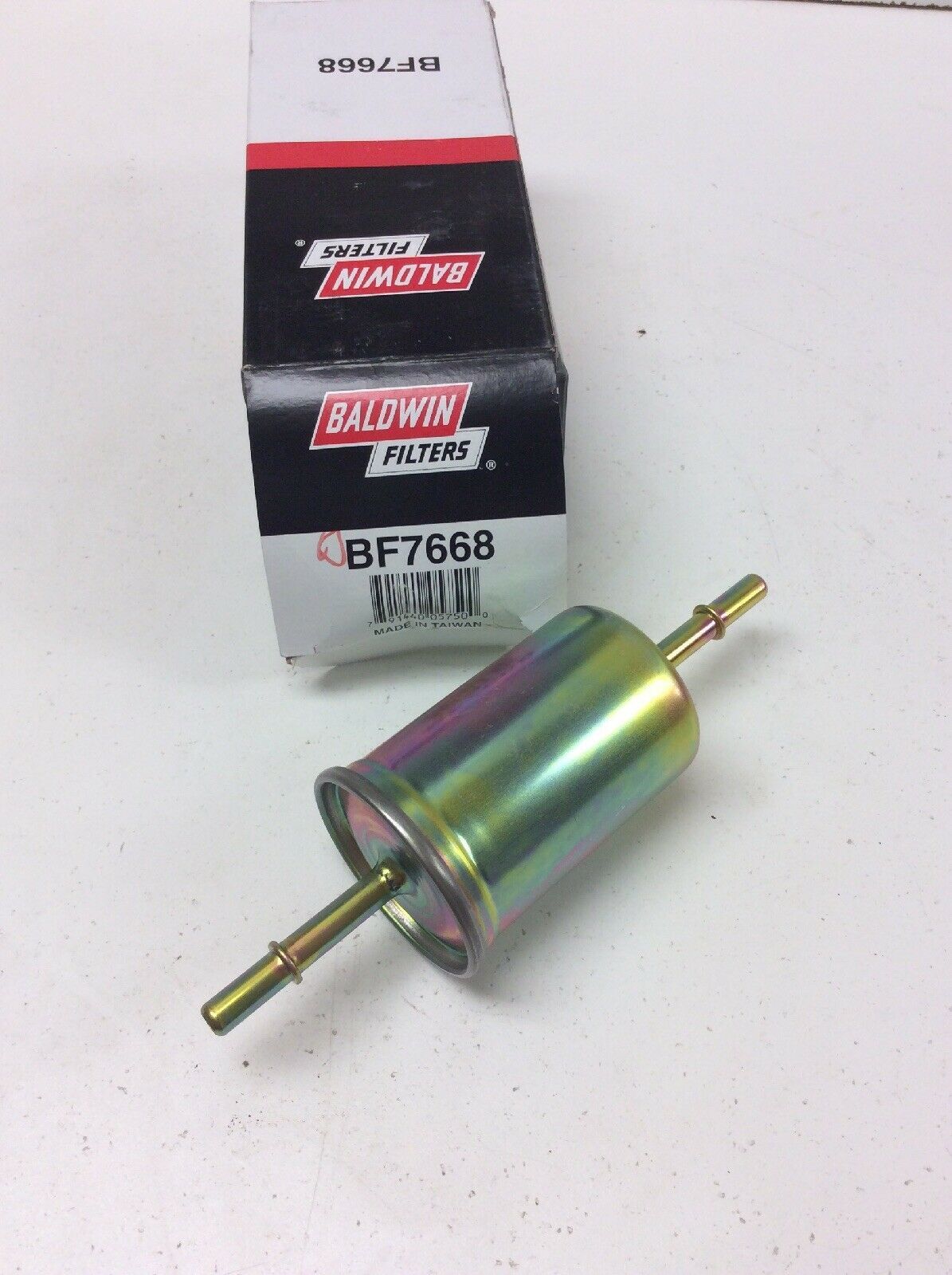 Fuel Filter BALDWIN BF7668, 5/16" Inlet, 5/16" Outlet, 7 3/32" Length