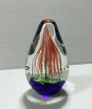 Egg shaped Art Glass paperweight, red palm tree on green &amp; cobalt blue g... - $29.95