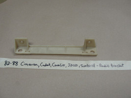 82-90 Gm Cavalier J2000 Sunbird Cimarron Dash Radio Mounting Mount Bracket Bezel - $24.99