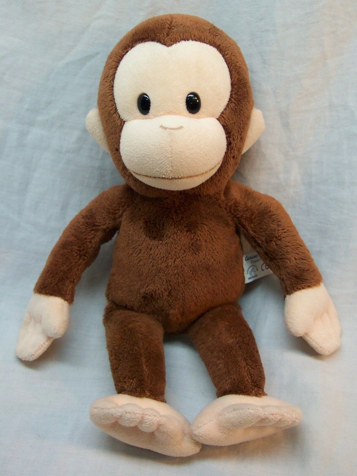 curious george talking giggling plush toy