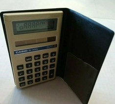 Vintage Casio SL-300G Solar powered pocket calculator with fold case - $12.19
