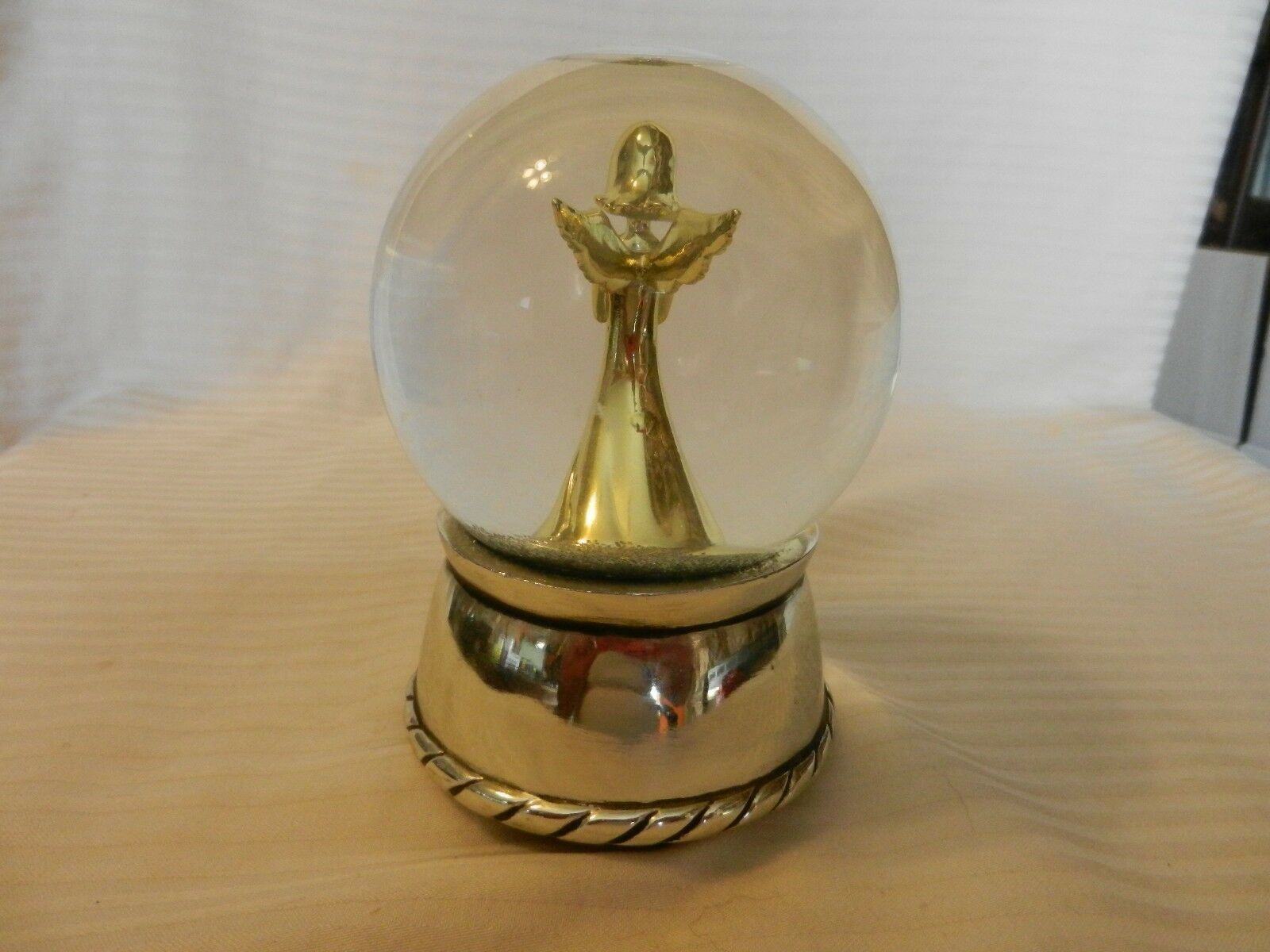 A friend is someone who reaches for your hand Angel Snow Globe Music