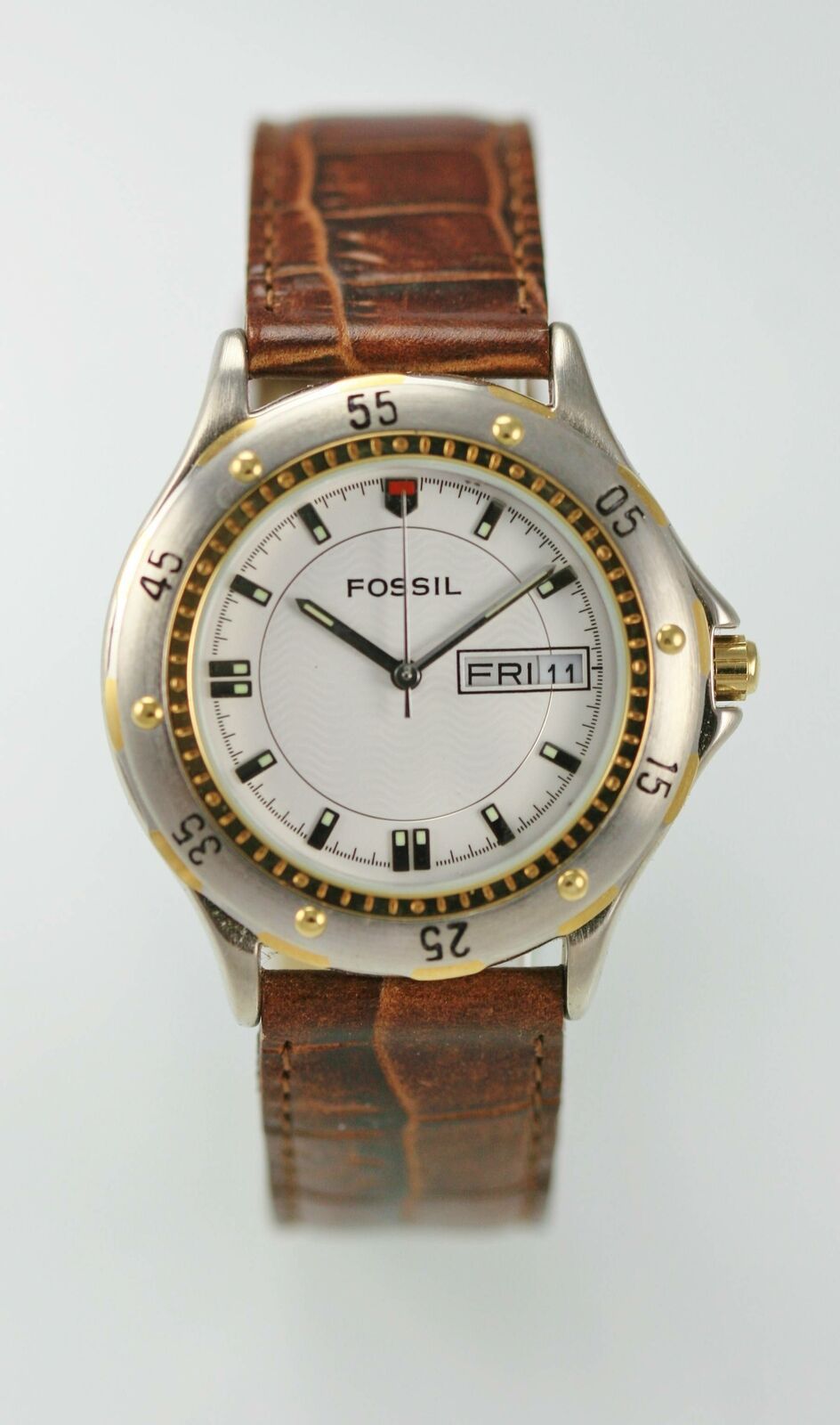gold and silver fossil watch men's