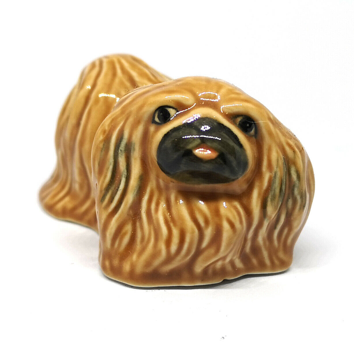 porcelain pekingese figurines
