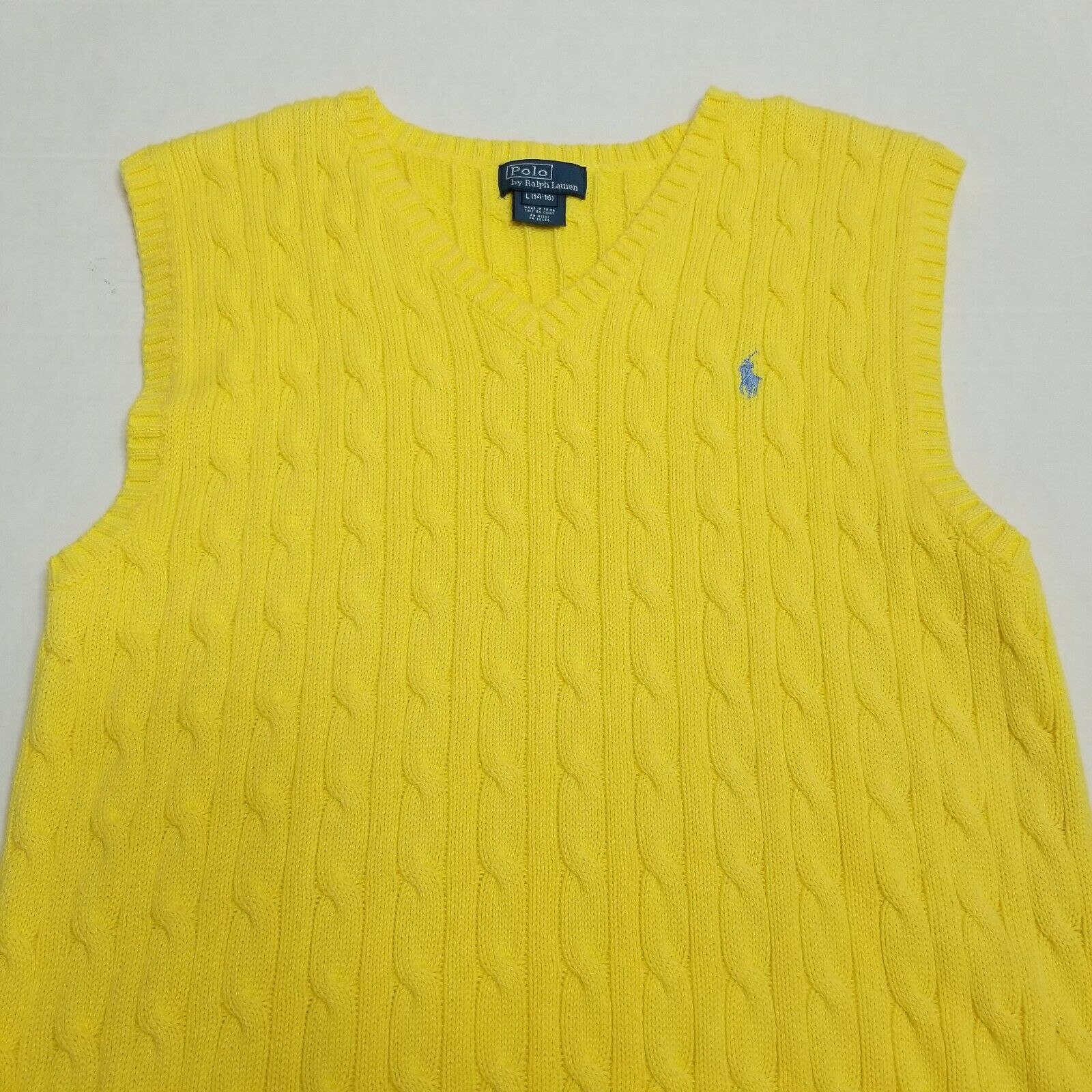 yellow polo sweater vest
