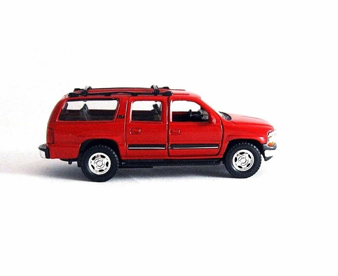 2001 chevrolet suburban dark green Welly auto modelo 1:24