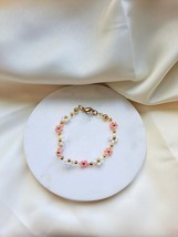 Handmade flower bracelets - $10.00