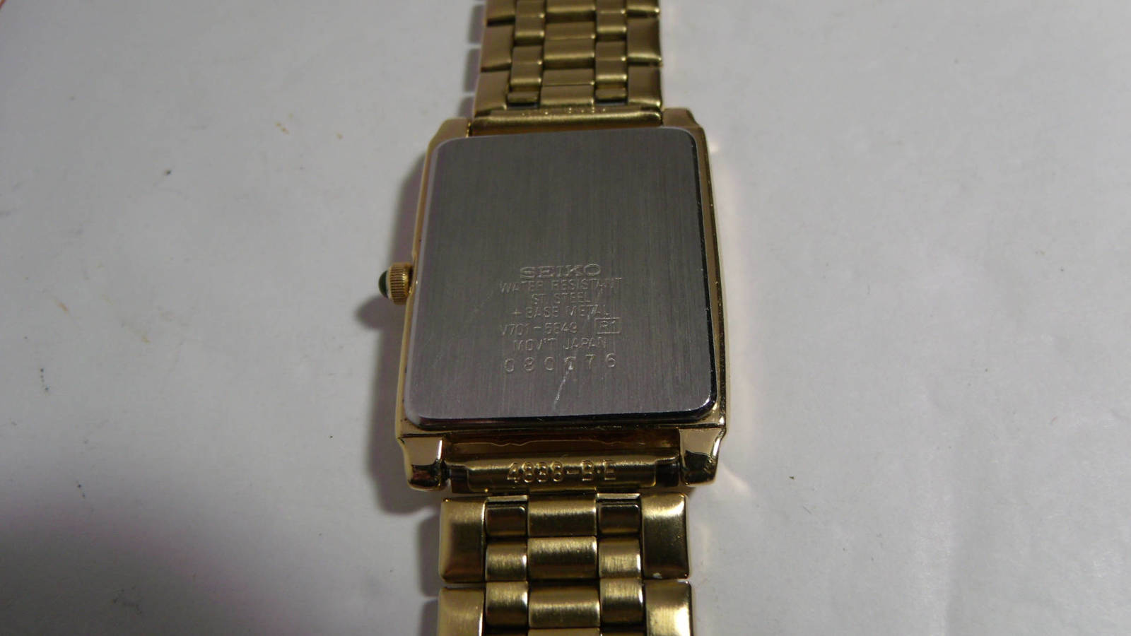 seiko gold watch with black face