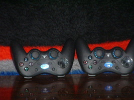 Pre-Owned 2 Playstation Logitech VV550 Cordless Game Controllers - $29.70