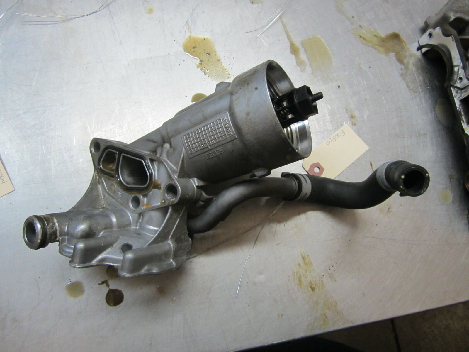 07Y003 ENGINE OIL FILTER HOUSING 2015 Chevrolet Trax 1.4 55566784 Car