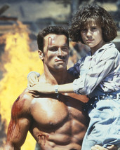Arnold Schwarzenegger and Alyssa Milano in Commando 16x20 Canvas Giclee - $69.99