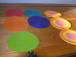 Used Lot Colorful Ridged Flexible Round Plastic & Orange Yellow Bullseye Coaster - $8.59