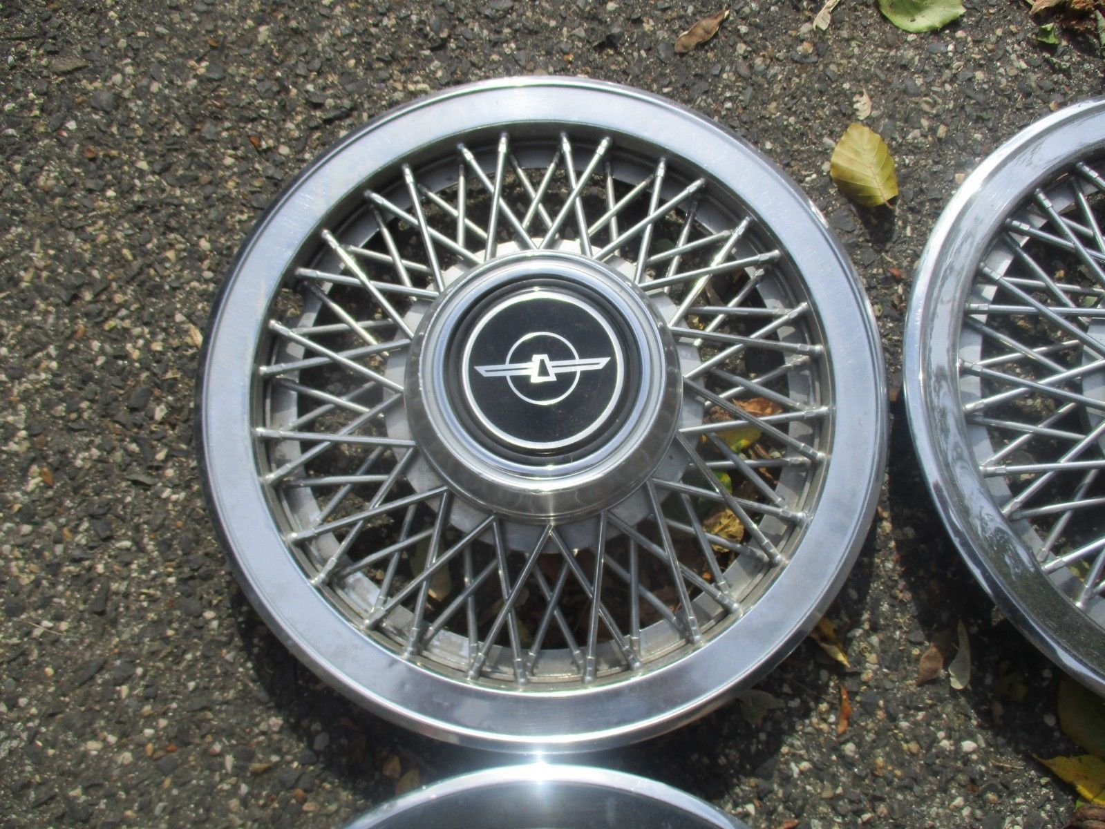 Lot of 4 1980 to 1988 Ford Thunderbird 14 inch wire spoke hubcaps wheel