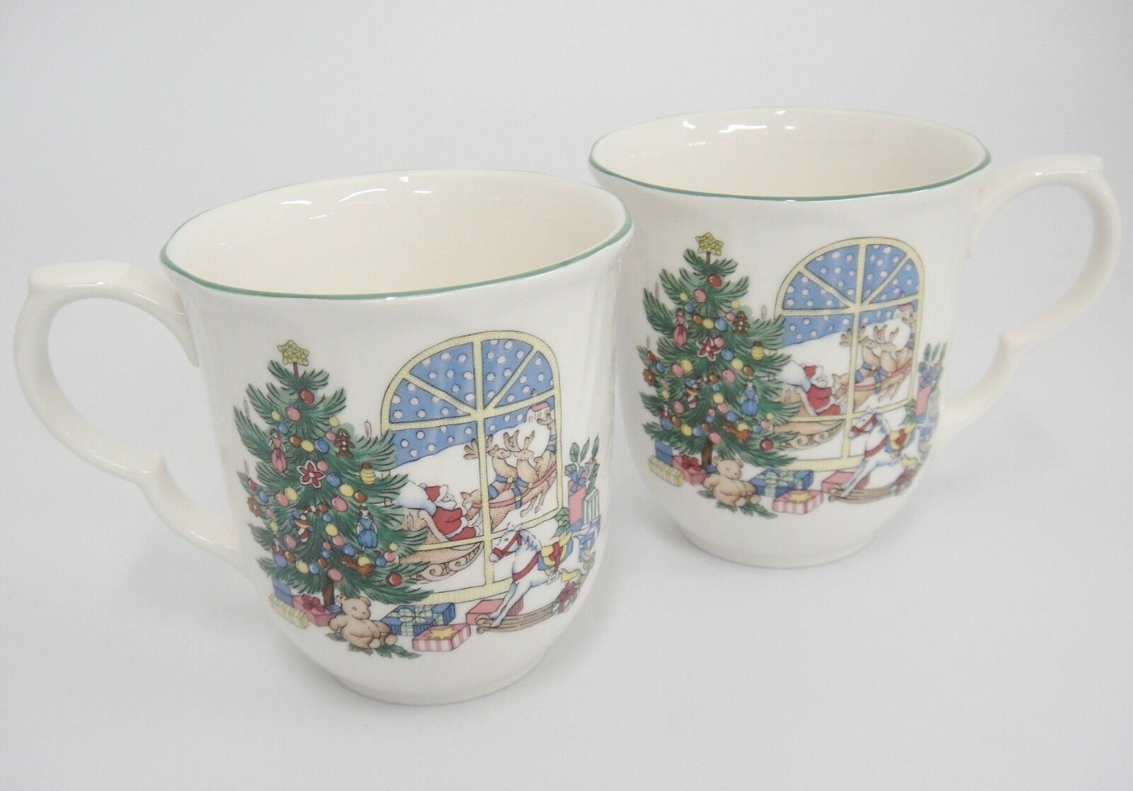 Primary image for Nikko Happy Holidays Christmas Tree Mugs Santa Sleigh Lot of 2 Porcelain