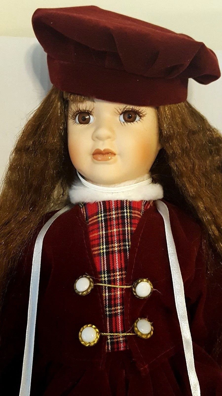 limited collection genuine porcelain doll and matching miniature ornament