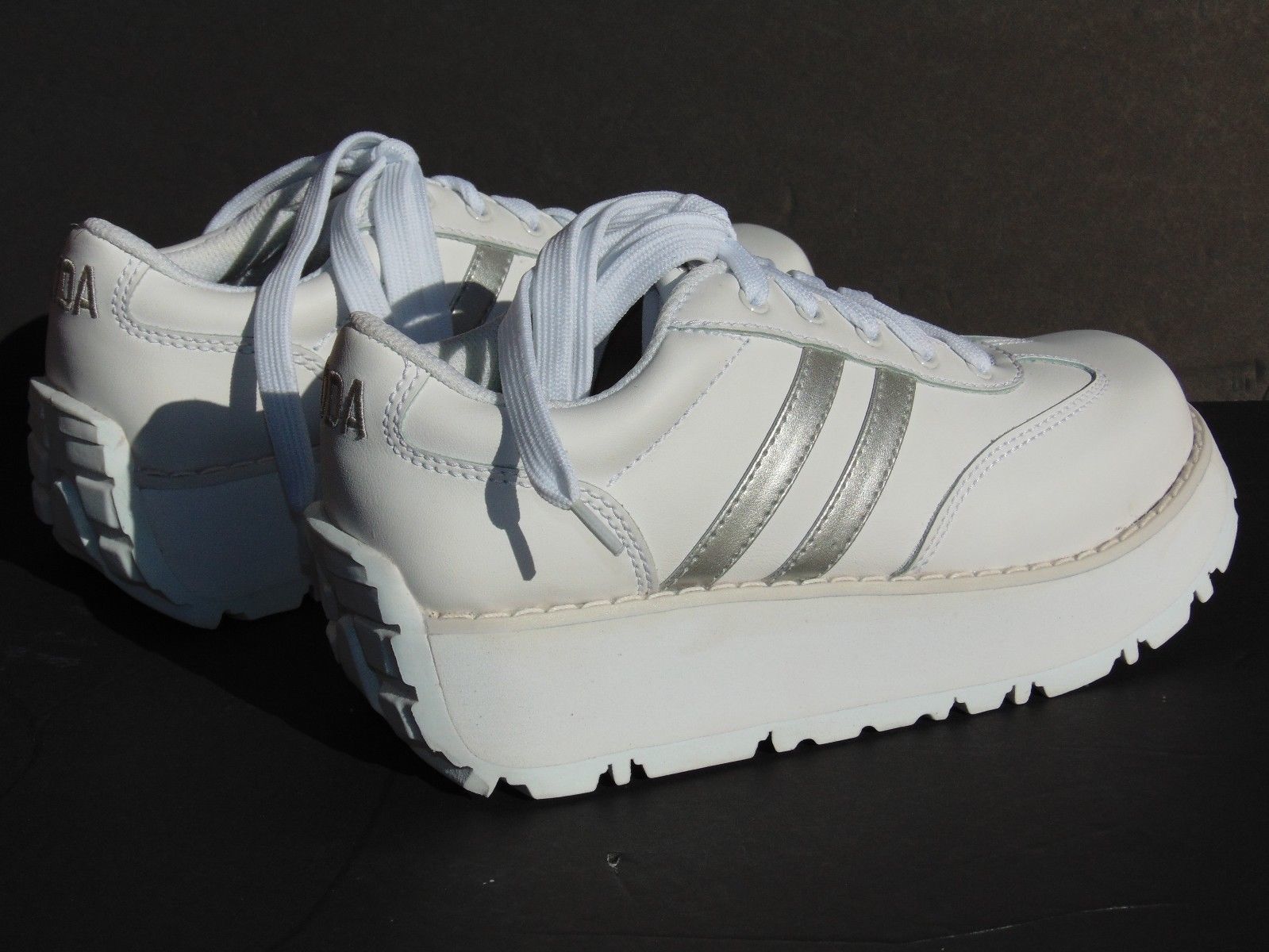 white soda platform shoes