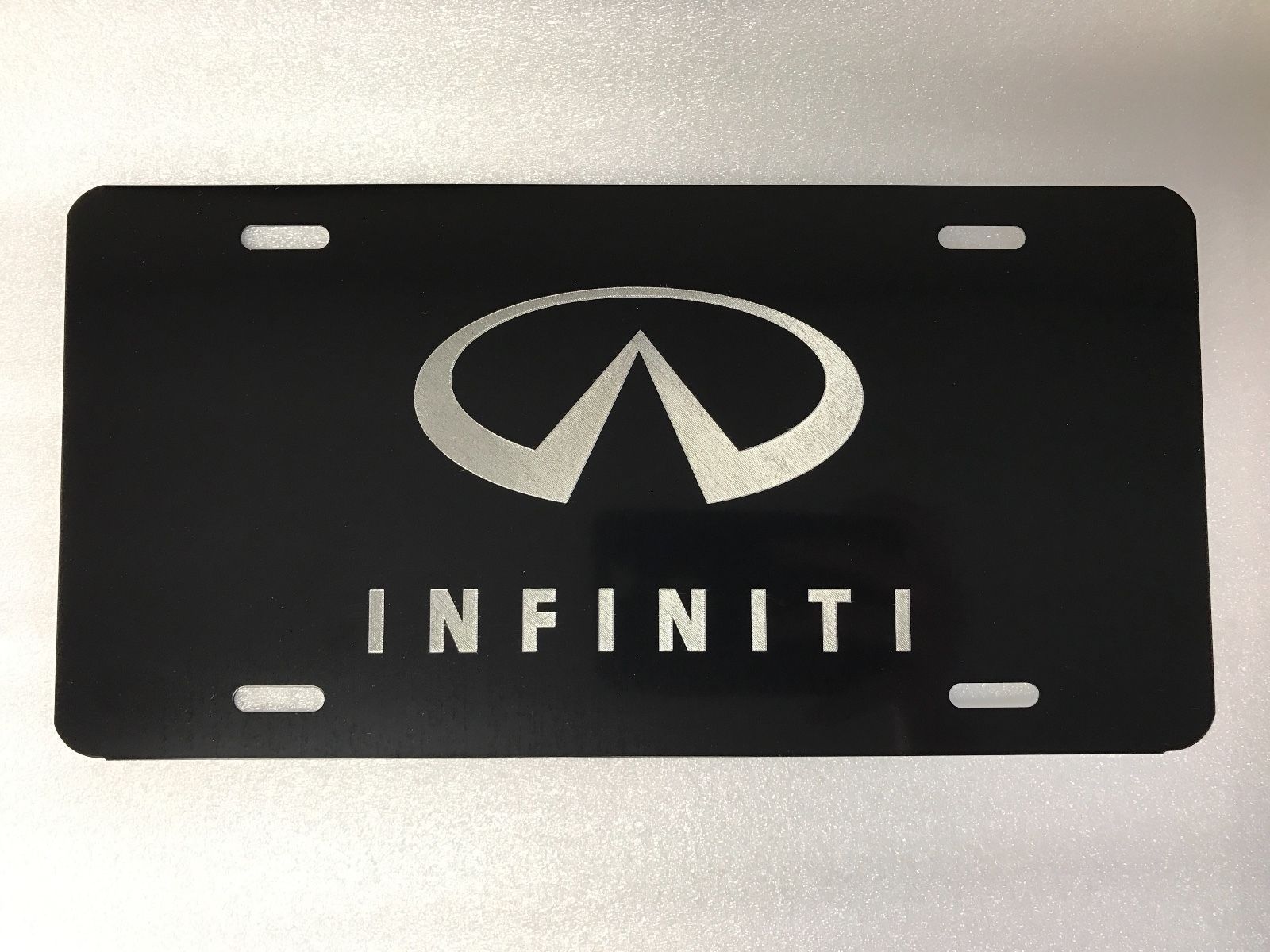 Infiniti Logo Car Tag Diamond Etched on Black Aluminum License Plate