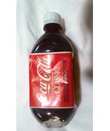 Coca Cola Classic   16 fl oz plastic bottle  full  with circle bottom - $8.42