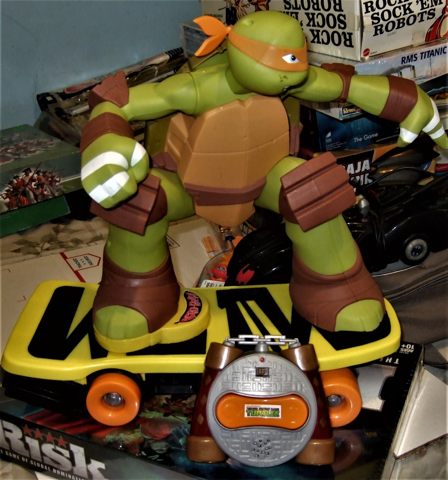 ninja turtle toy on skateboard