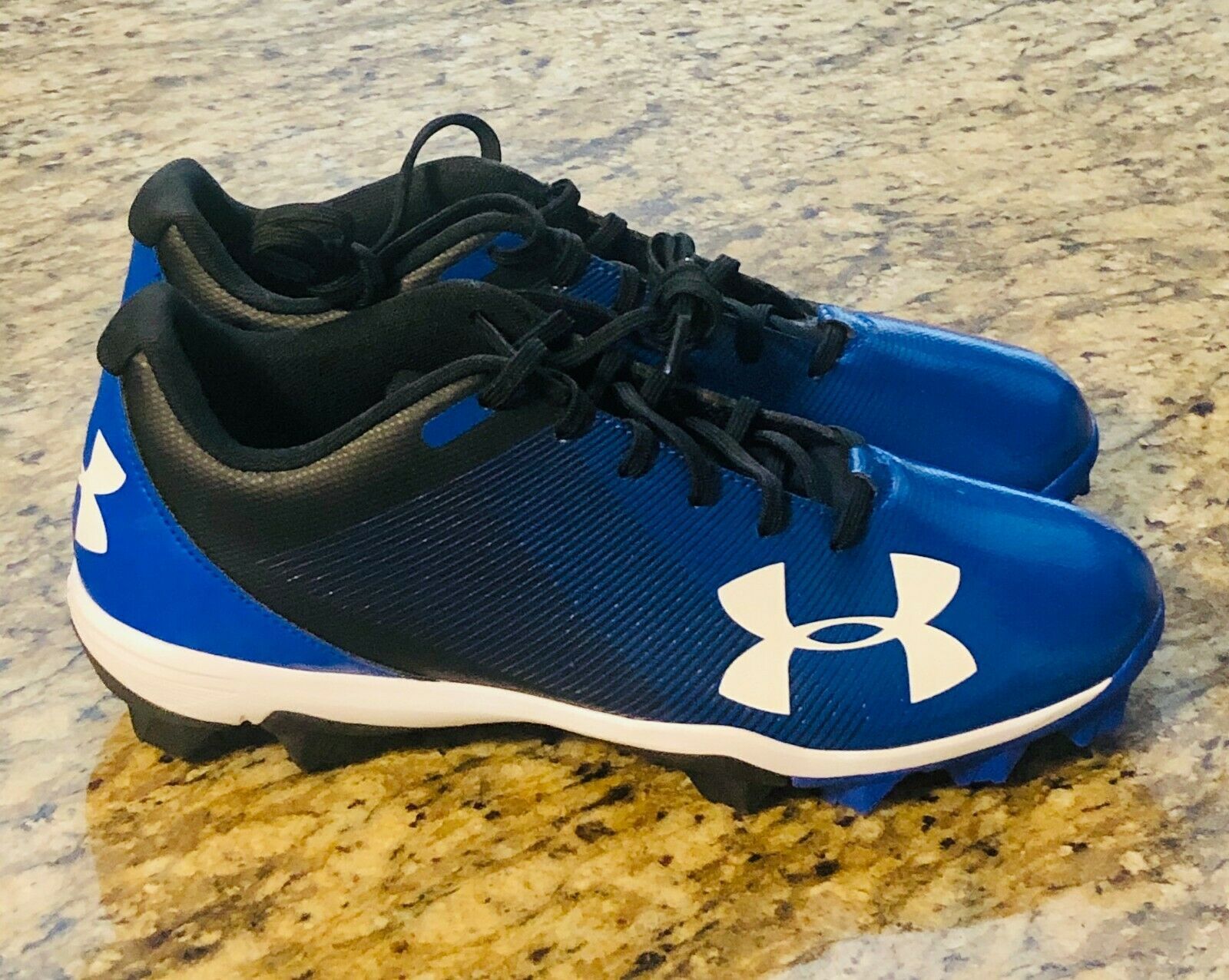 blue under armour baseball cleats