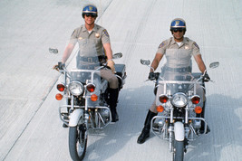 Larry Wilcox and Erik Estrada in CHiPs on police motorbikes rising 18x24 Poster - $23.99