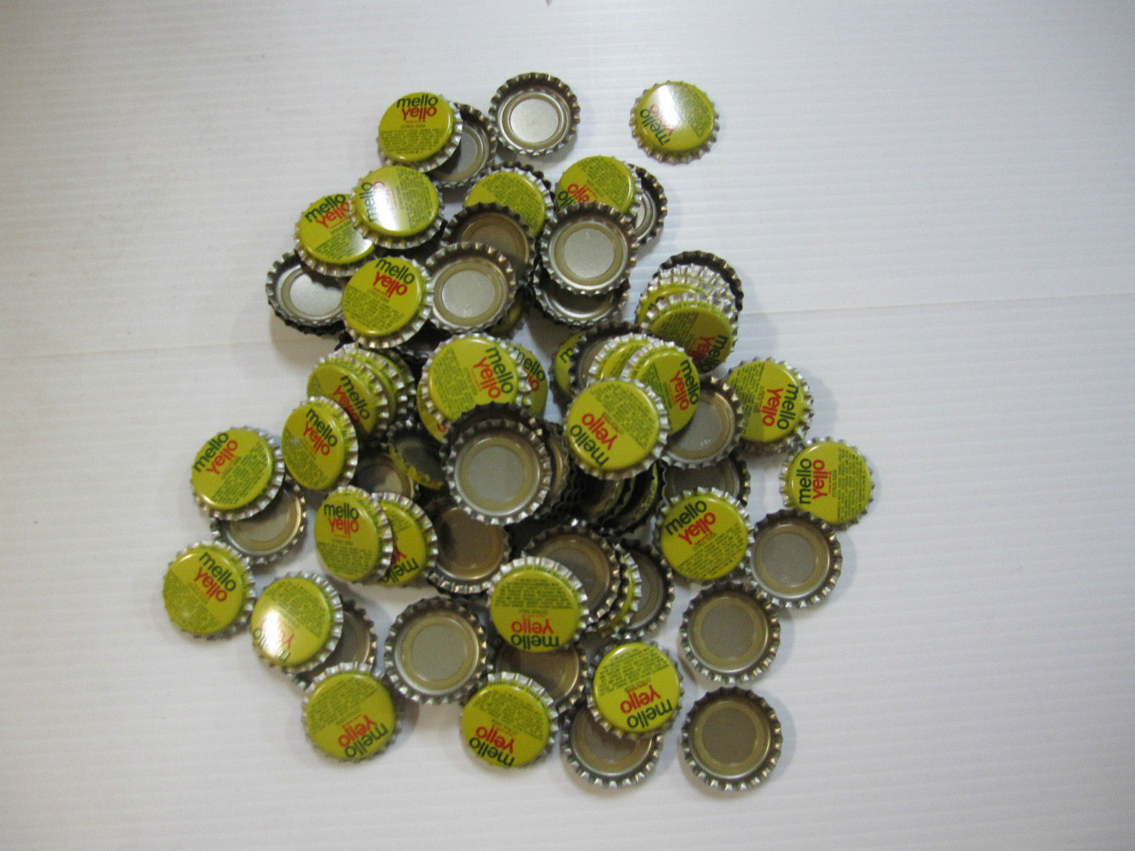 100 Mellow Yellow Bottle Caps - Never Used - $9.89