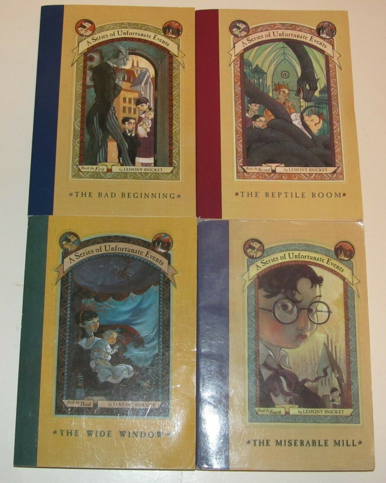 The First 4 Books in the Series of Unfortunate Events by Lemony Snicket