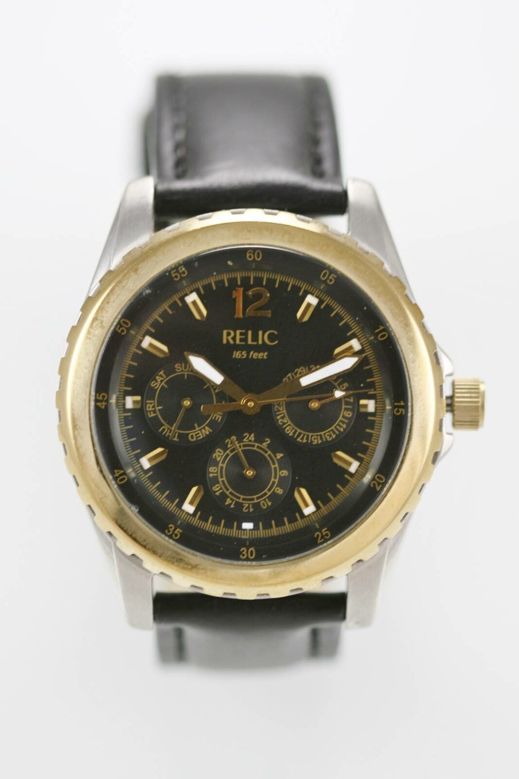 reloj de hombre dorado