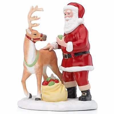 Santa with Reindeer and Toy Bag Figurine