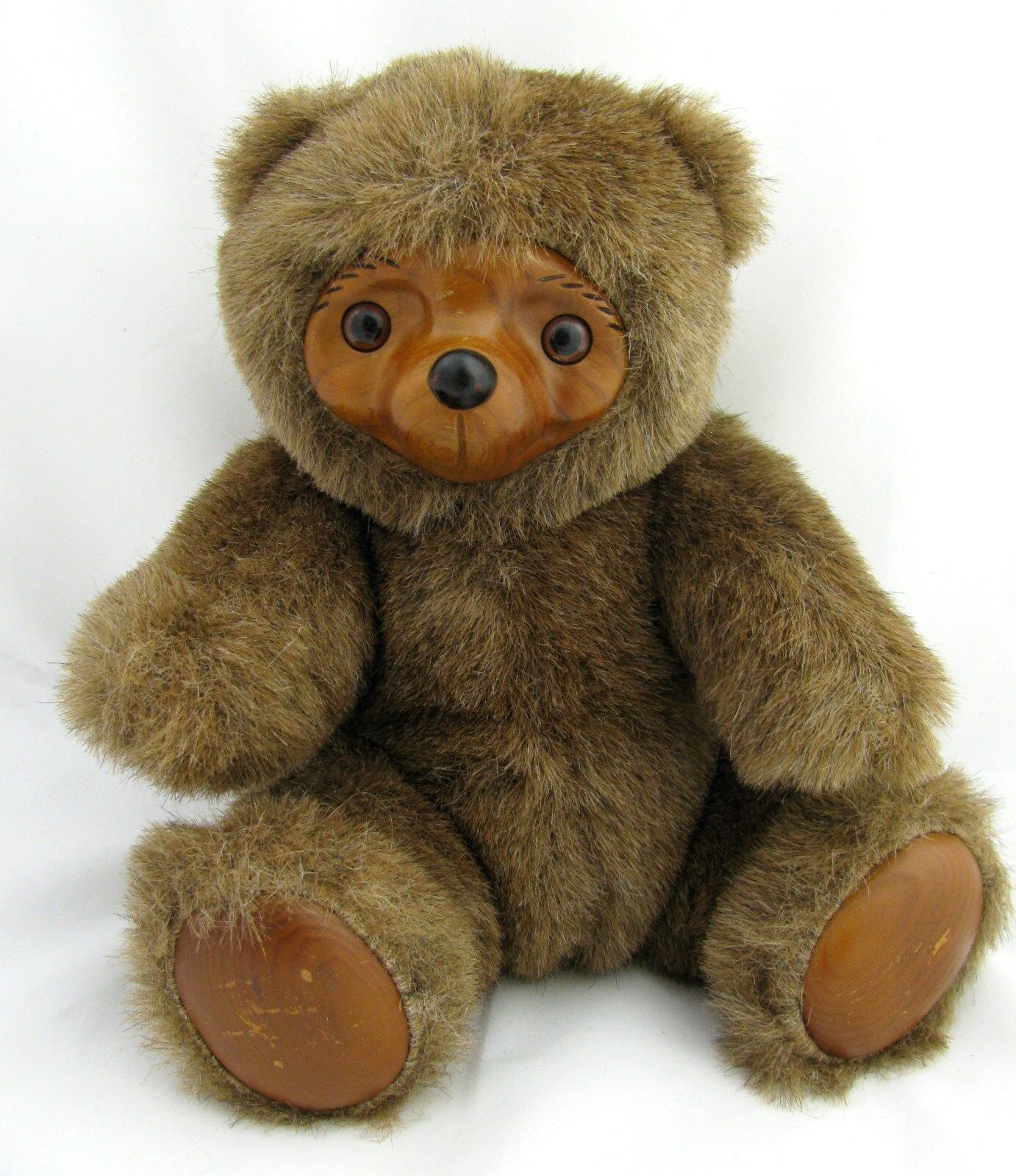 teddy bear with wooden face