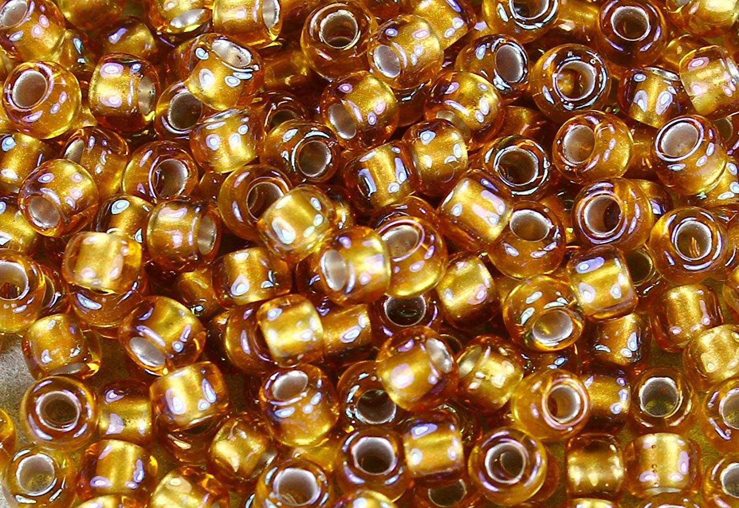 Size 6/0 Japanese Toho Round Seed Beads, #278- Gold-Lined Topaz , 20g package