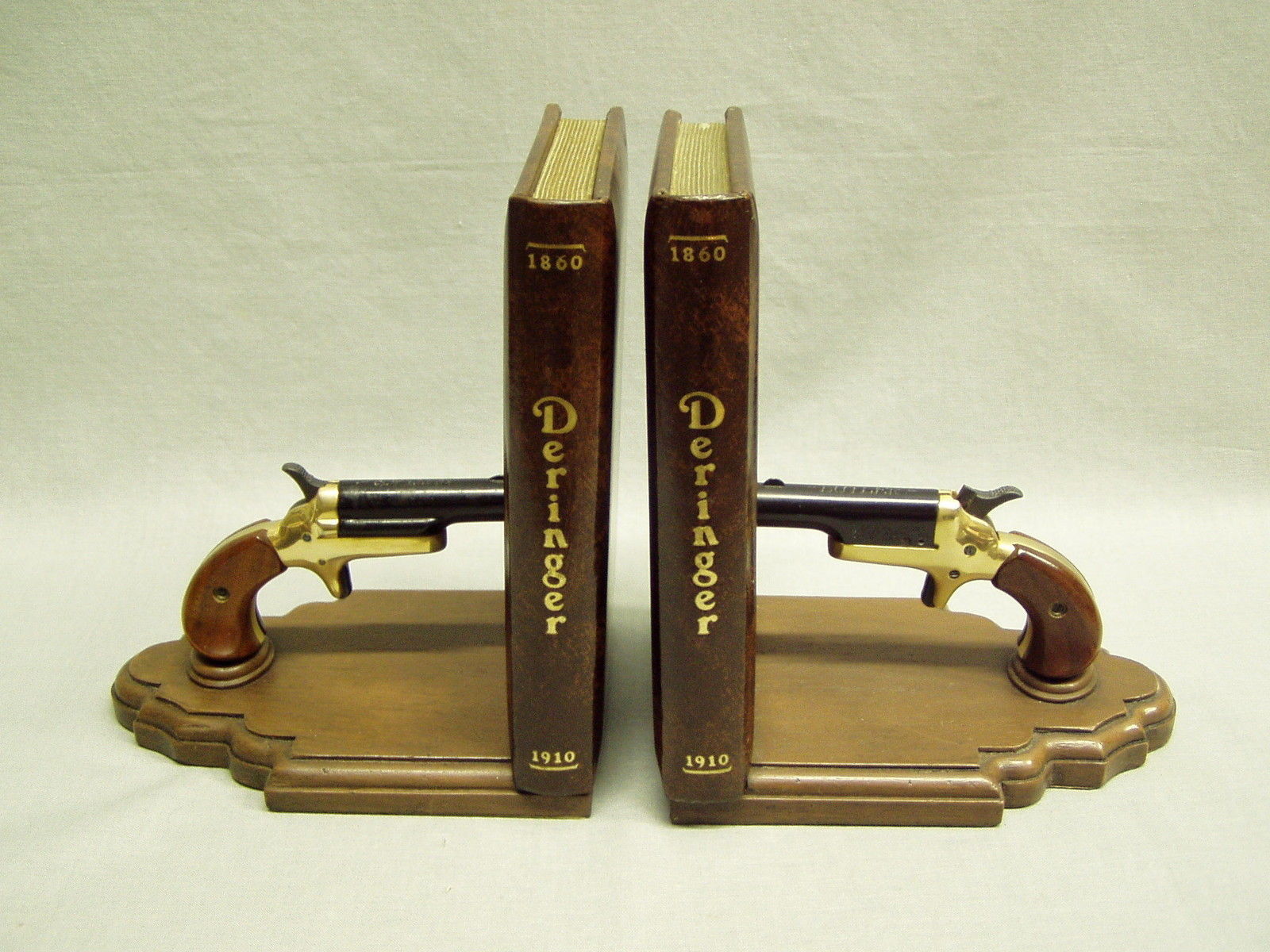 Vintage Deringer Bookends display 22 cal short guns, pistols by Butler