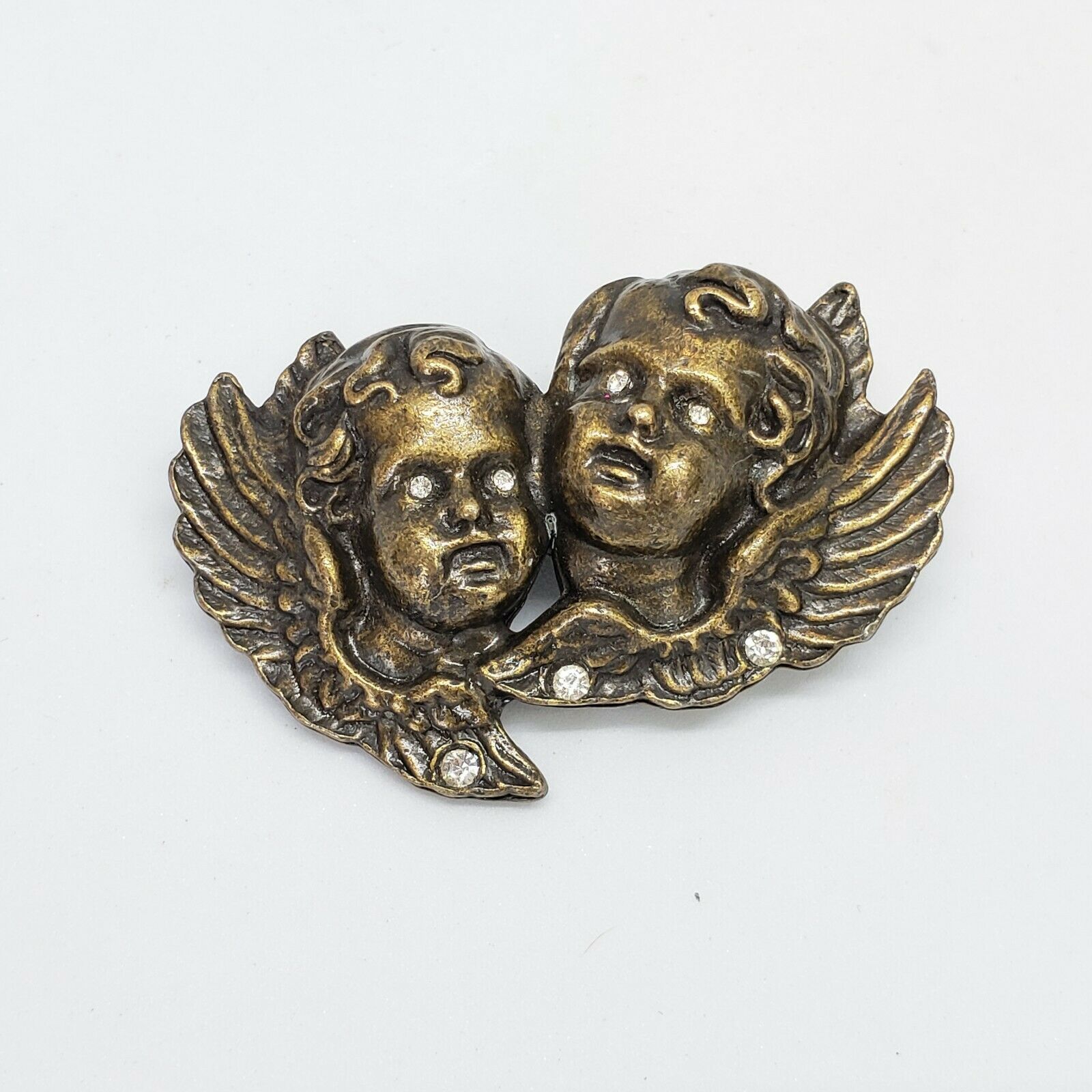 Vintage angel brooch pin with swirly pattern /& butterfly wings silver tone metal with white faux pearl ; about 1 12 x 1 in.