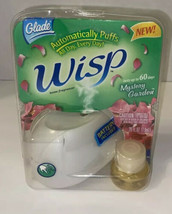 1 New Glade Wisp Automatic Puffs Home Fragrancer W/ Mystery Garden Scented Oil - $32.73