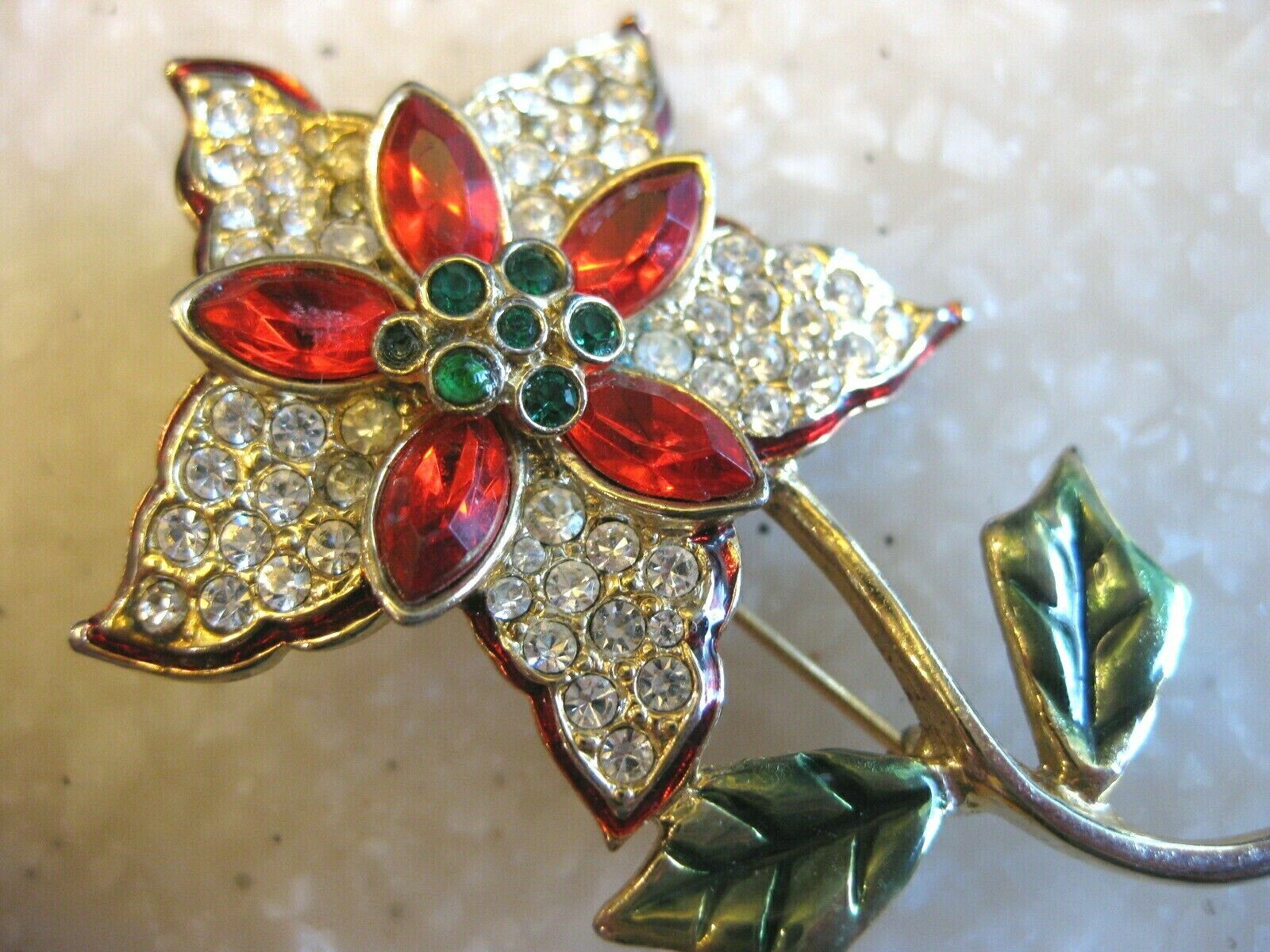 Primary image for Gold Tone MONET Rhinestone Poinsettia Christmas Pin Brooch, Enameled Leaves